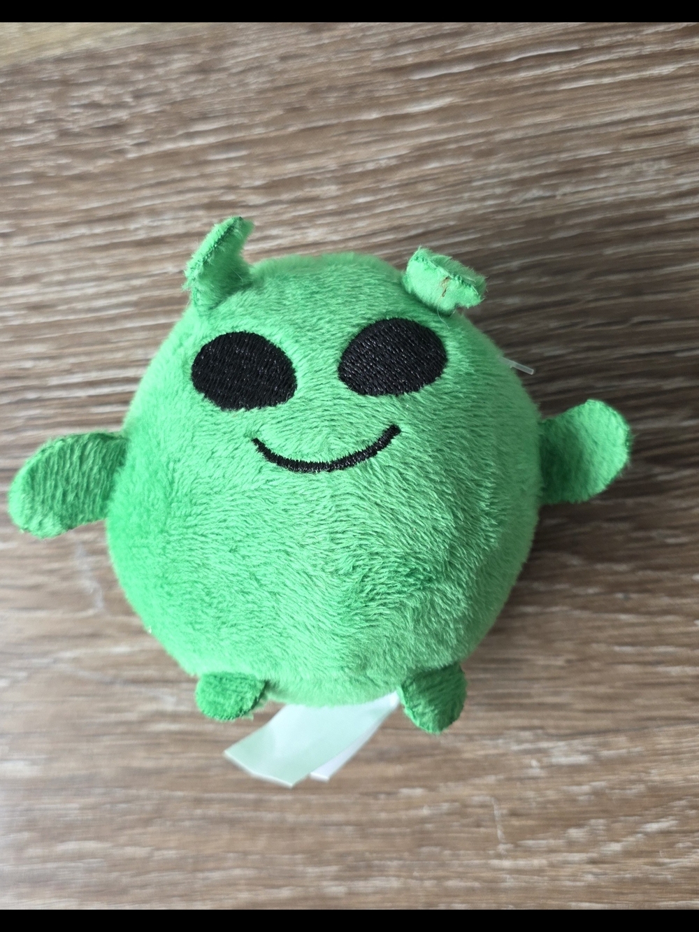 Mi Bright Green Alien Plush Ball with Black Embroidered Face